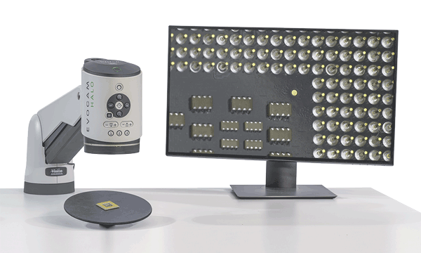 Monitor mounted on digital microscope showing metal precision components